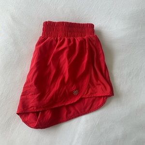 Red athletic shorts